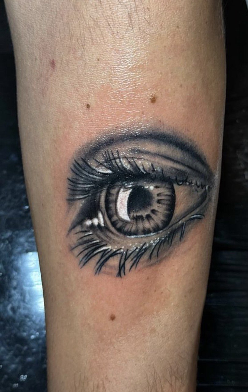 TATUAGGIO LISSONE STILE REALISTICO